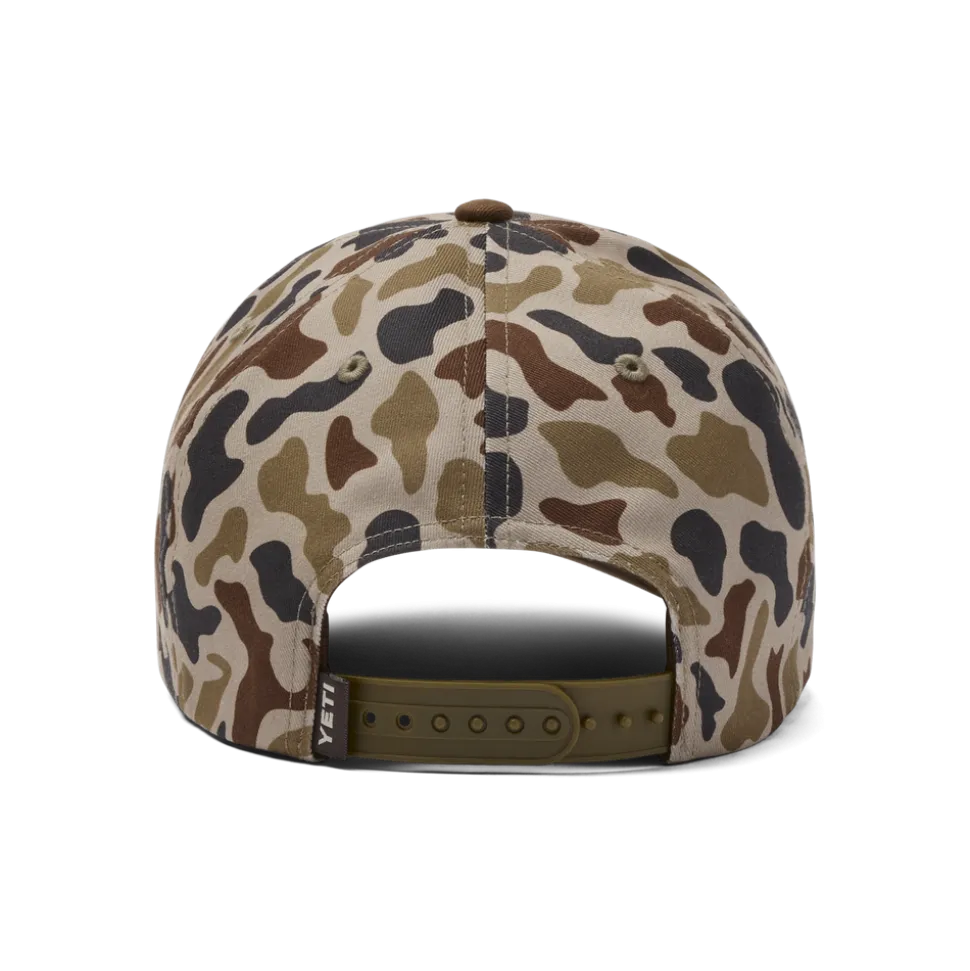 YETI® Wetlands middelhoge pet met platte klep in camouflagestijl, met logobadge